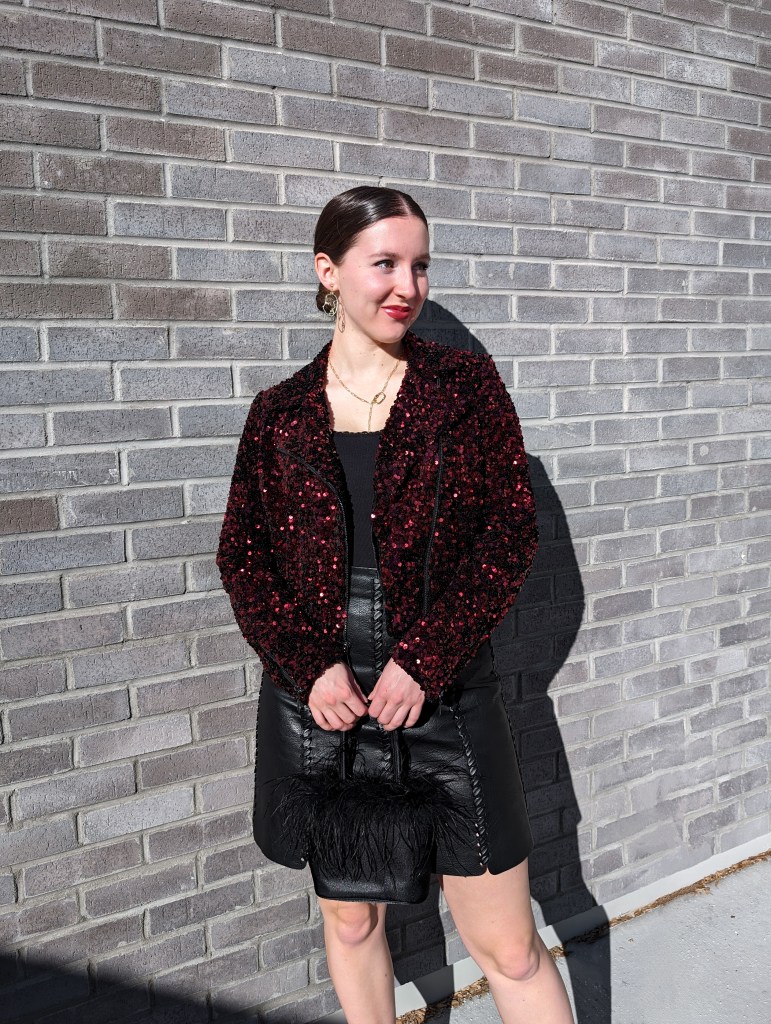 leather-skirt-red-sequin-jacket-black-leather-skirt-slicked-back-low-bun-red-lipstick