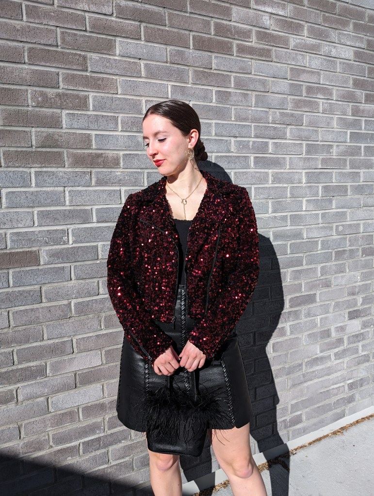 red-sequin-jacket-black-leather-skirt-slicked-back-bun-valentines-day-outfit-date-night