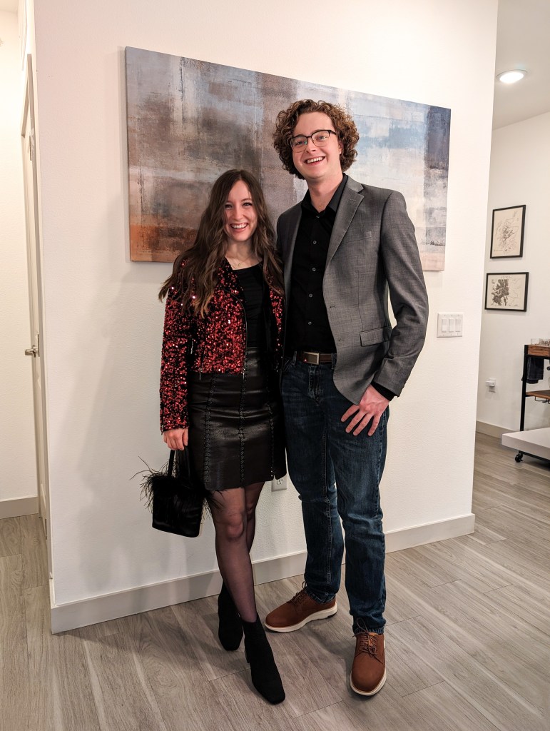 red-sequin-jacket-black-leather-skirt-furry-purse-vivaia-booties