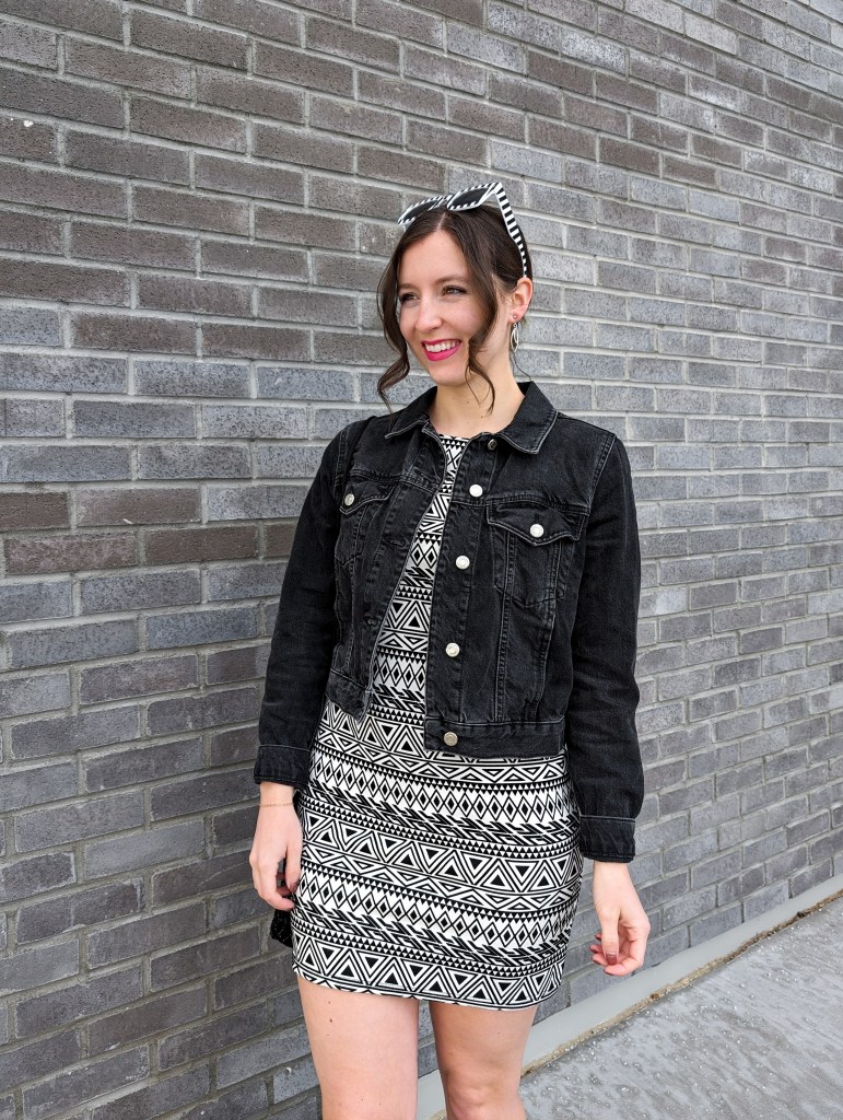 black-denim-jacket-patterned-dress-thrifted-striped-sunglasses