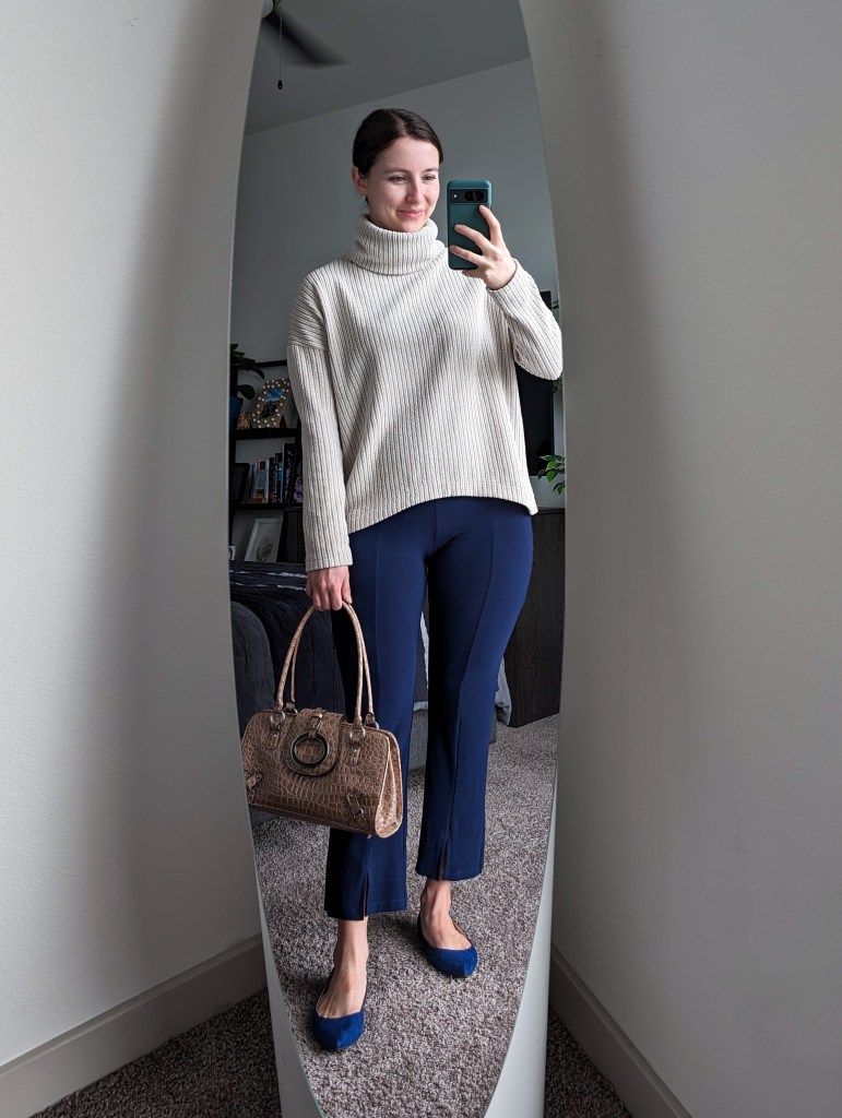 beige turtle neck sweater navy cropped pants blue flats
