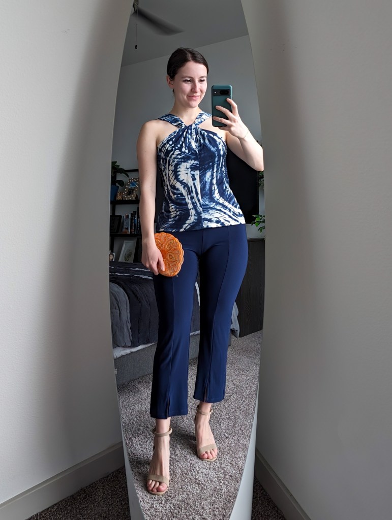 blue printed halter blouse navy ponte pants nude sandal heels orange beaded clutch