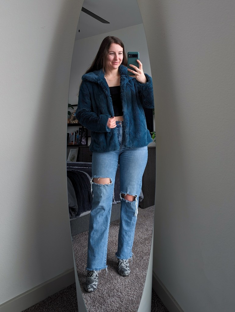 karaoke outfit black crop top teal faux fur jacket thrifted ripped straight leg jeans snakeskin sandals