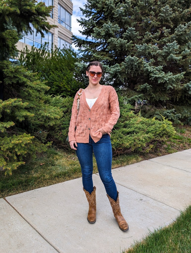 skinny jeans cowgirl boots spring outfit peach fuzz pantone color of the year