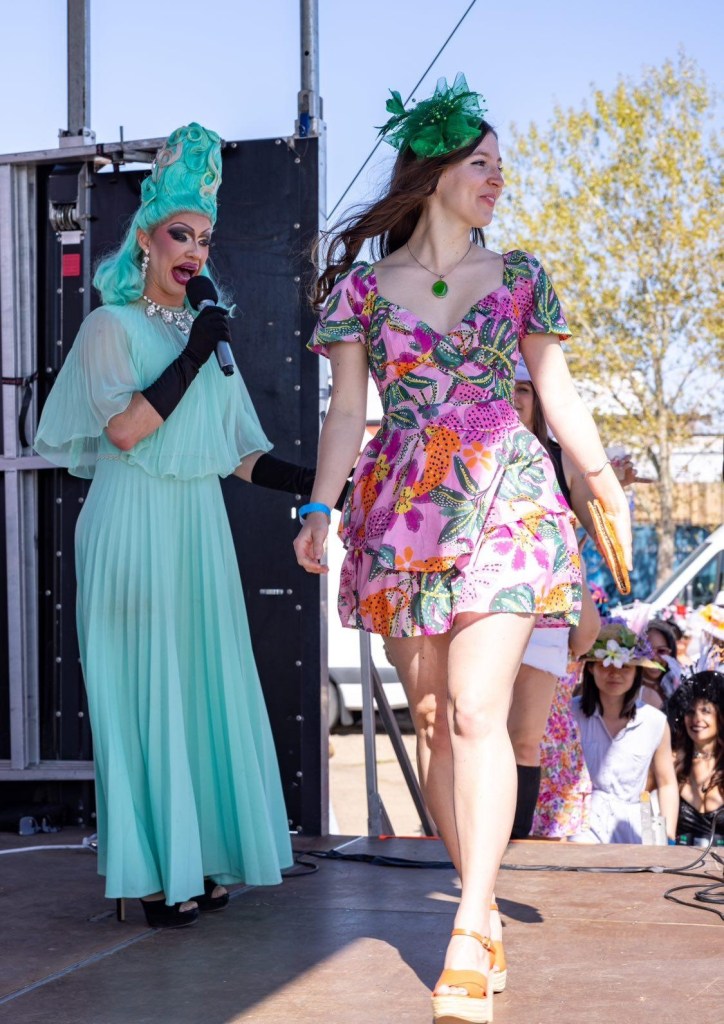 denver mini derby fashion show drag queen pink and green dress best dressed contest