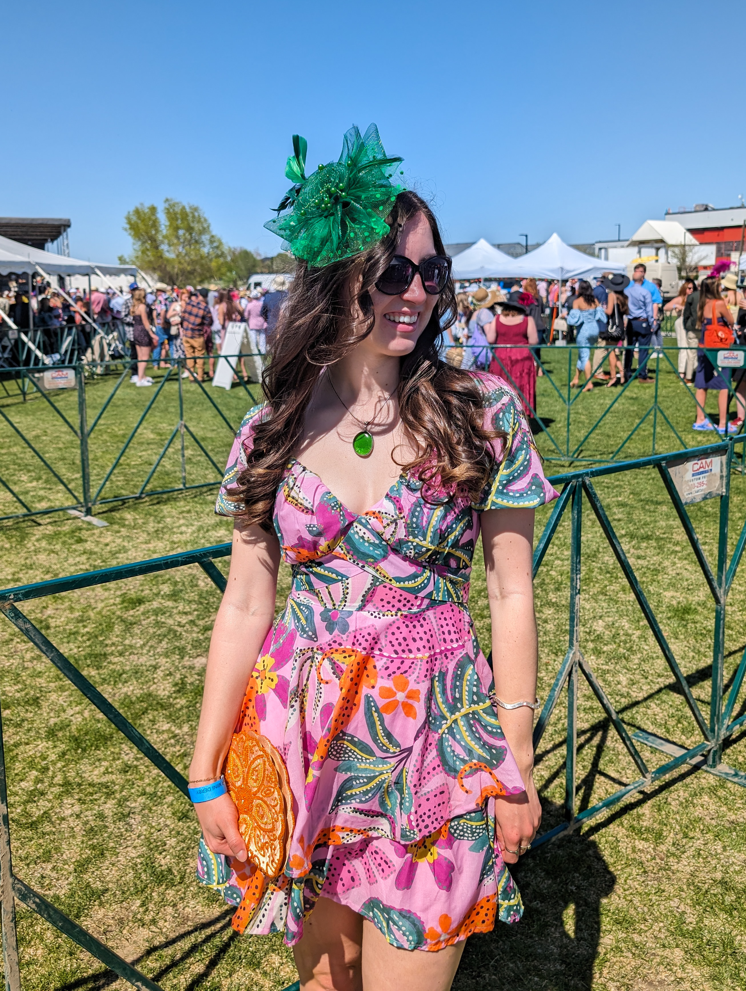 green fascinator statement necklace pendant pink and green printed dress