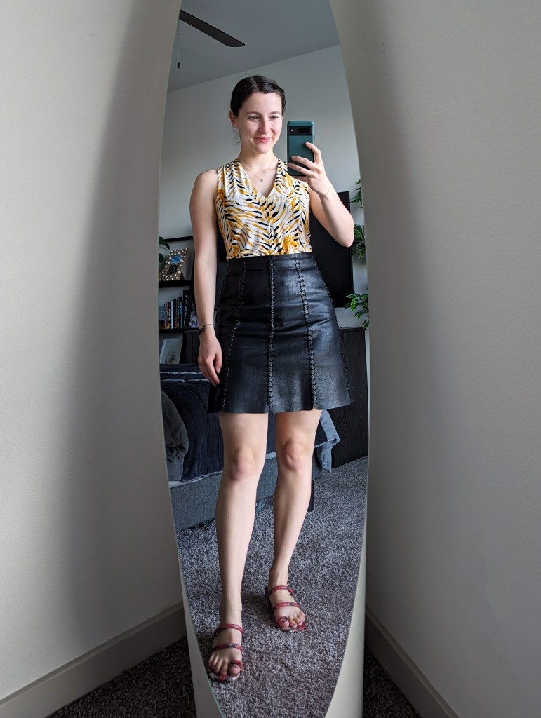 yellow printed blouse clara sunwoo black leather skirt red snakeskin sandals