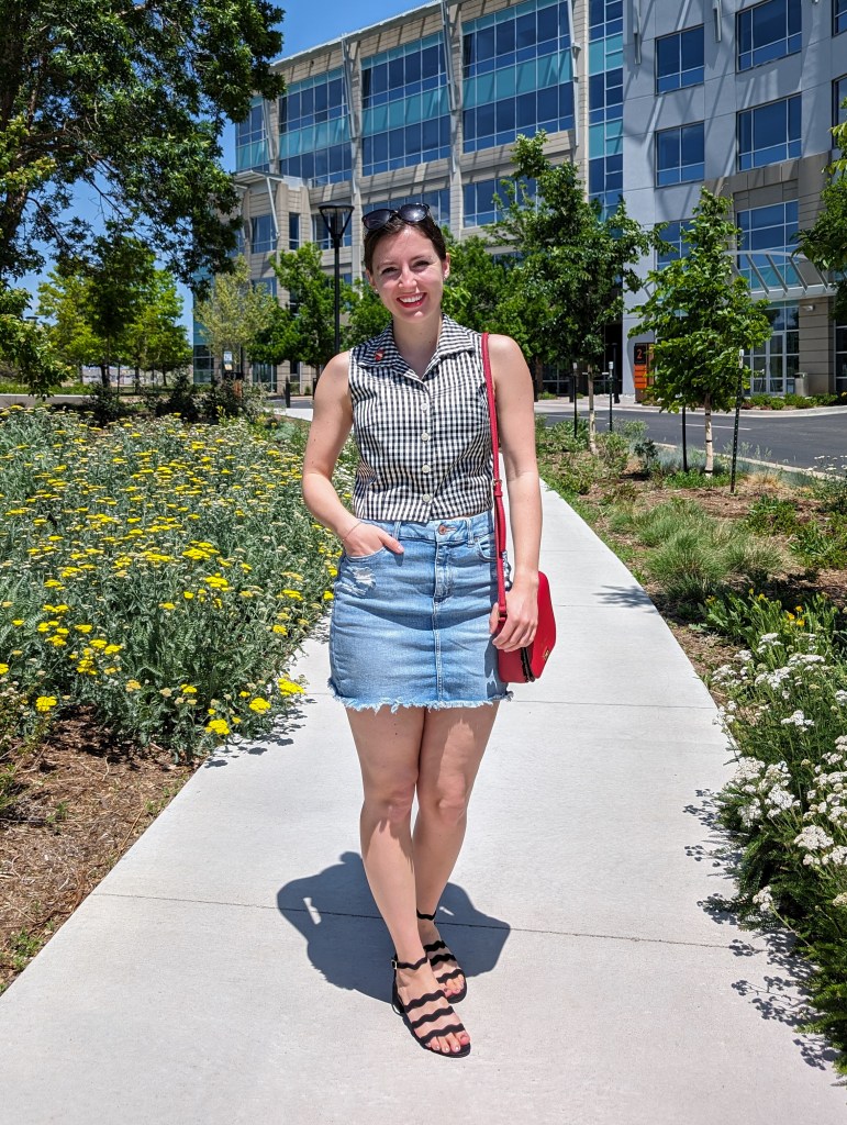 gingham button down top denim skirt black sandals red purse kate spade