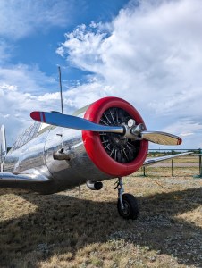 red and silver airplane WWII era boulder airport 1940s ball