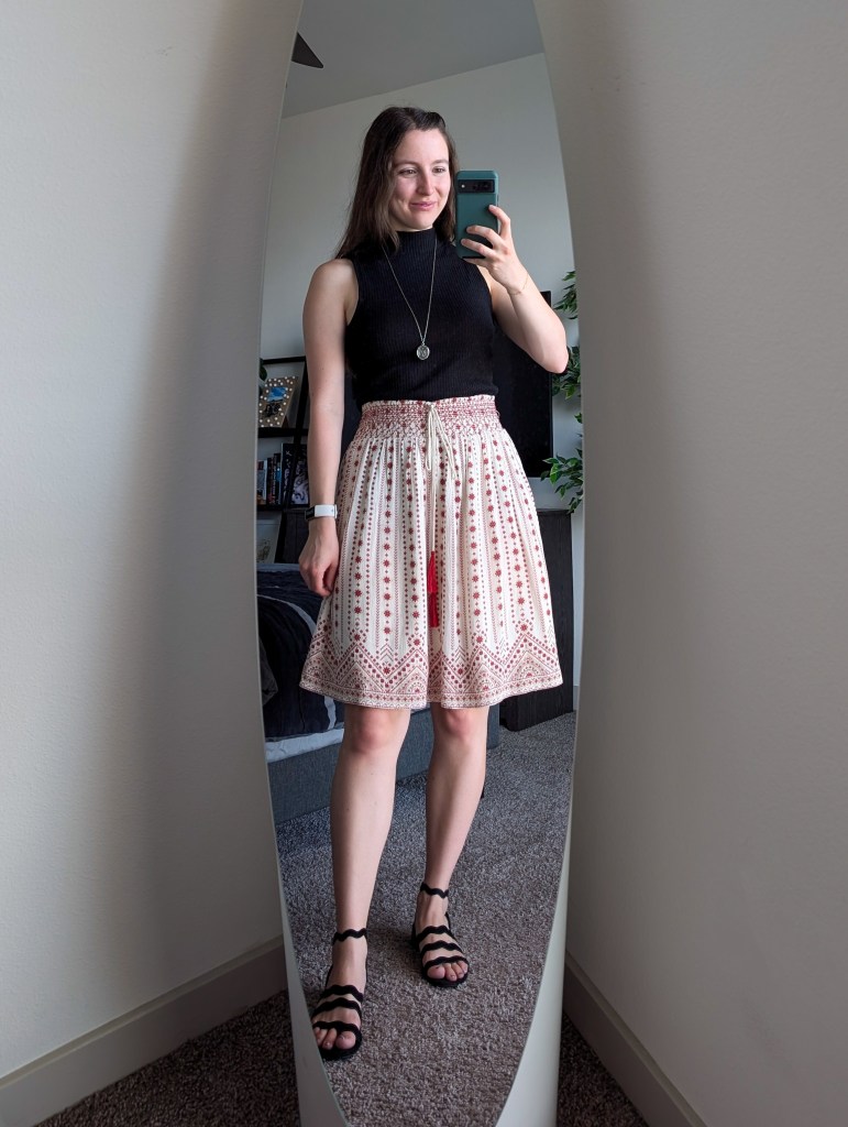 black mock neck top printed skirt black sandals summer style