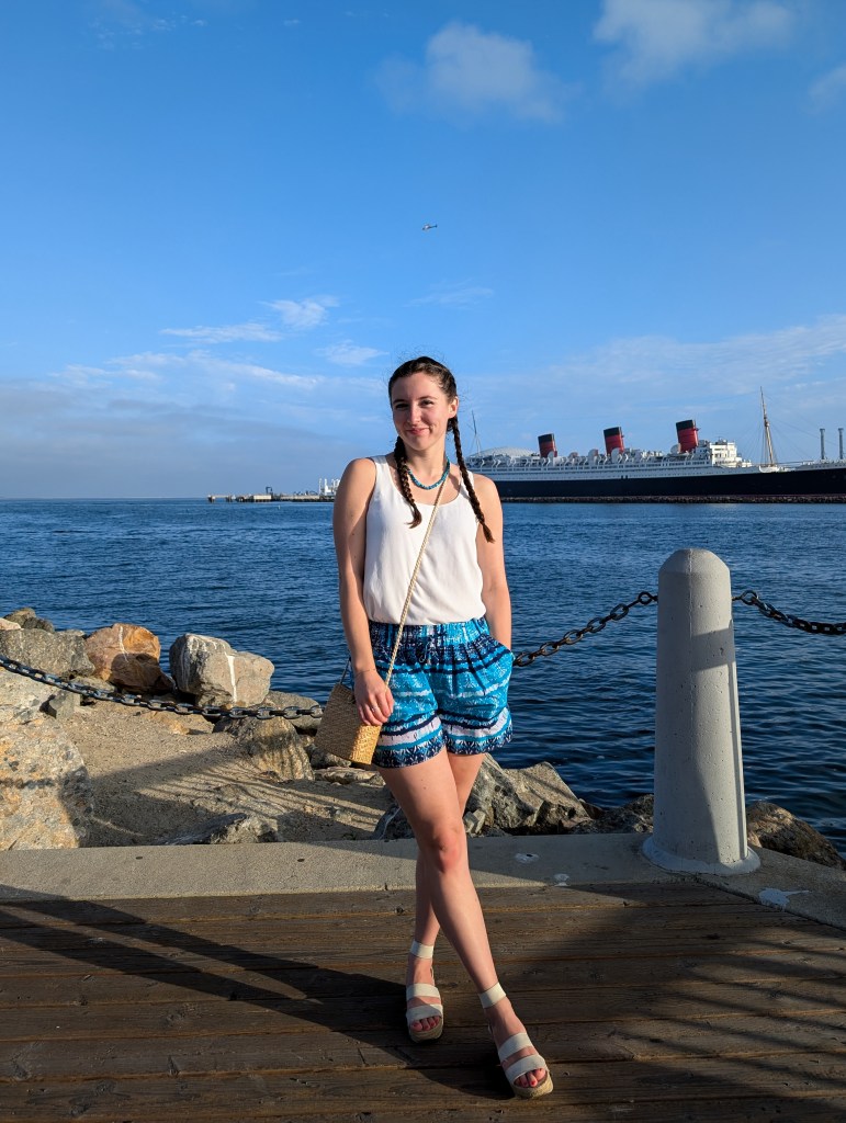 vacation outfit white blouse turquoise shorts espadrilles queen mary shoreline california