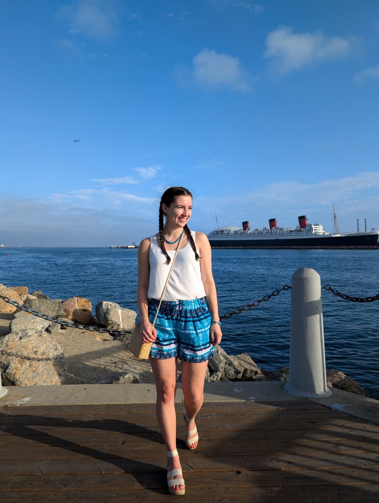 white thrifted blouse california first cruise vacation outfit turquoise shorts white espadrilles
