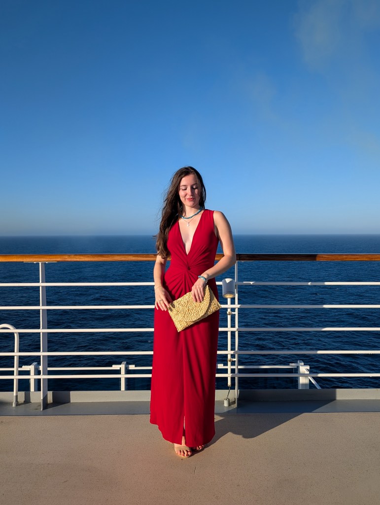 red dress clara sunwoo plunging gown deep neckline raffia clutch purse