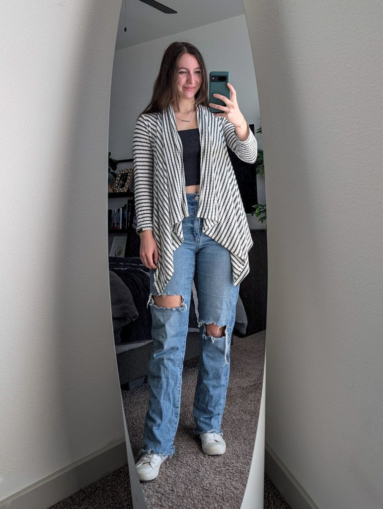 black crop top printed cardigan ripped straight leg jeans white sneakers