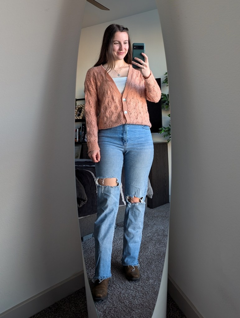 white crop top peach cardigan ripped straight leg jeans cowgirl boots fall outfits