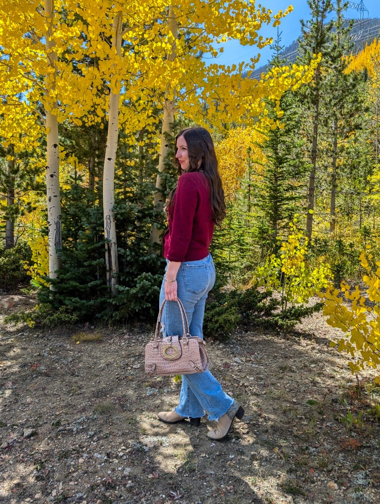 wearing your cardigan as a top straight leg jeans patent leather shoulder bag fall fashion