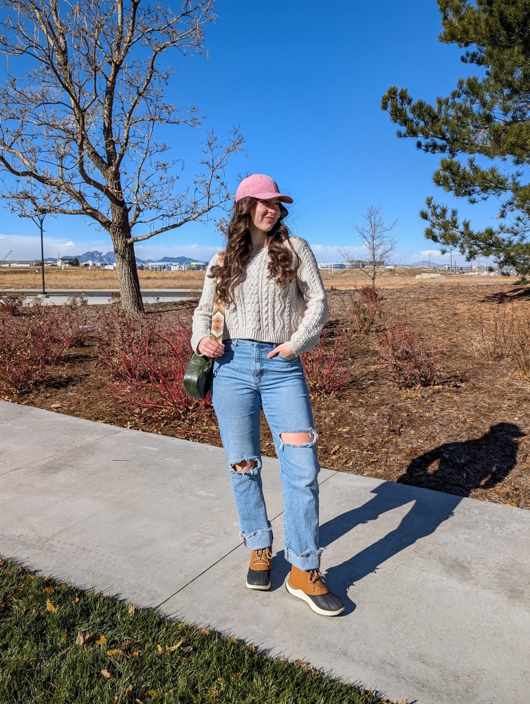 beige sweater ripped straight leg jeans winter outfit pink ballcap duck boots justfab fall style