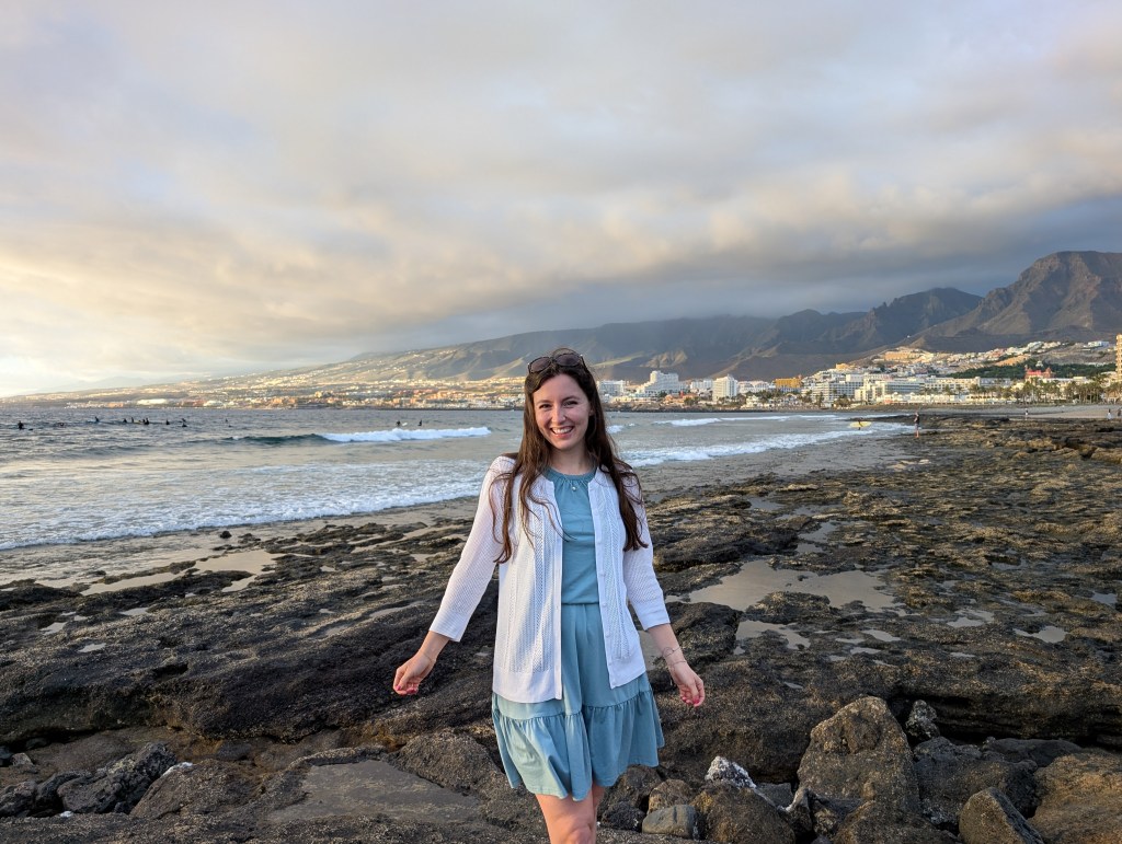tenerife costa adeje canary islands volcanic scenery black sand beach white cardigan thrifted find blue dress amazon
