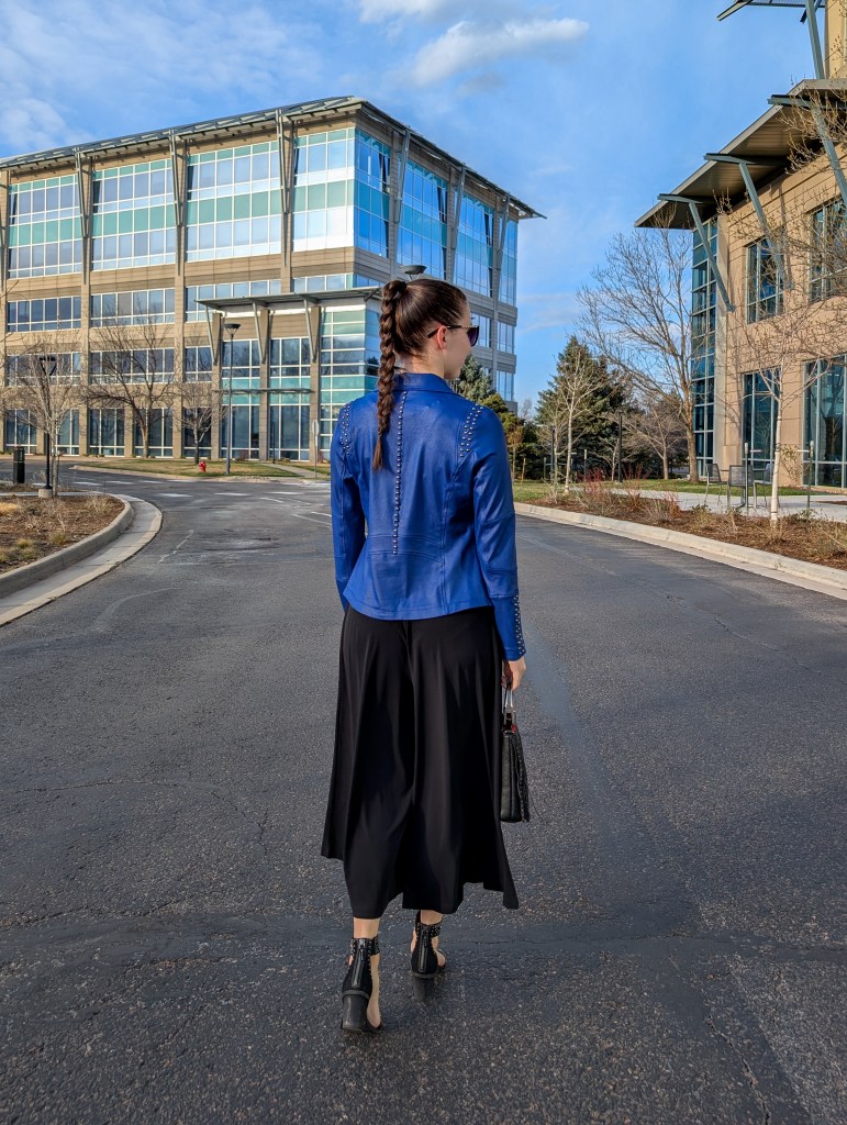 month in review monthly recap blue studded moto jacket black jumpsuit studded heels