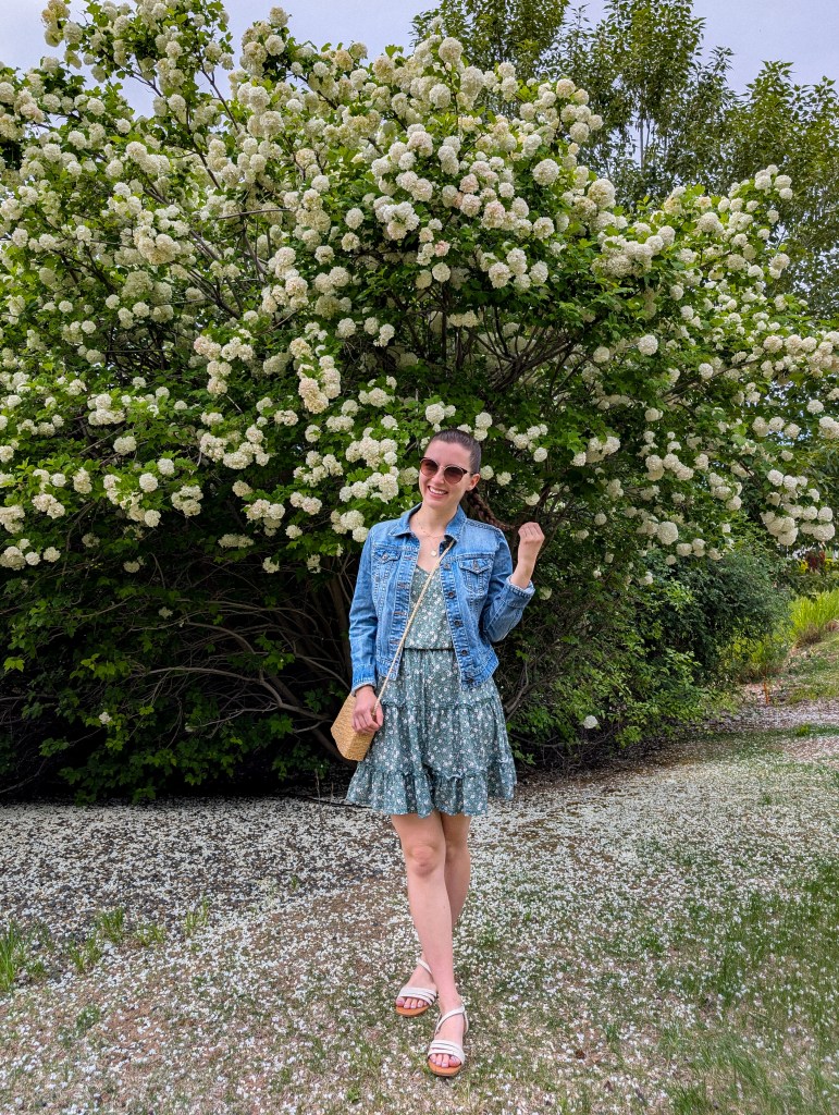denim jacket green floral dress wicker purse spring fashion summer style