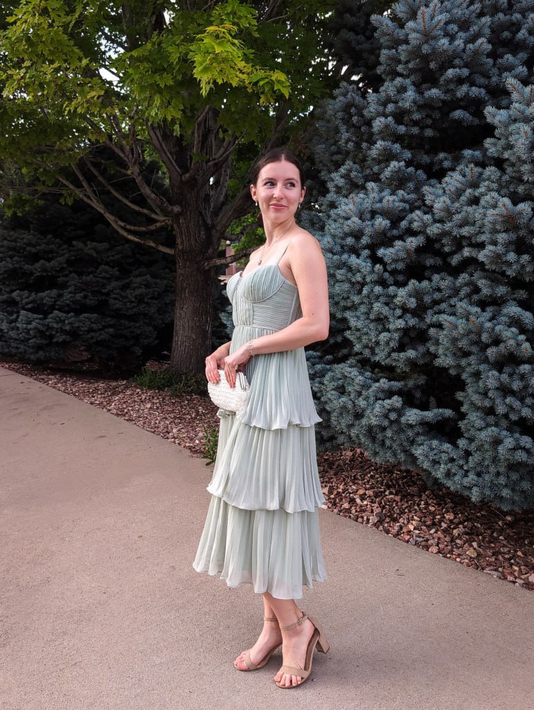 tiered dress nude heels pearl clutch sage green wedding guest formal wear