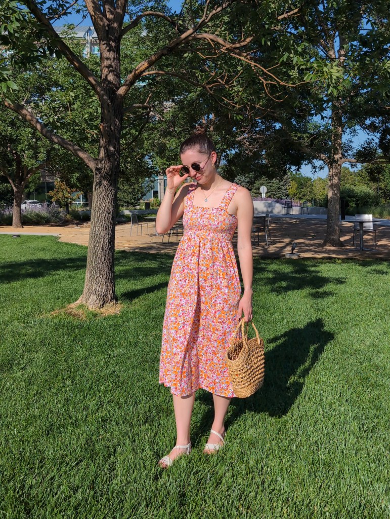 floral dress smocked affordable fashion wicker purse white sandals cost per wear