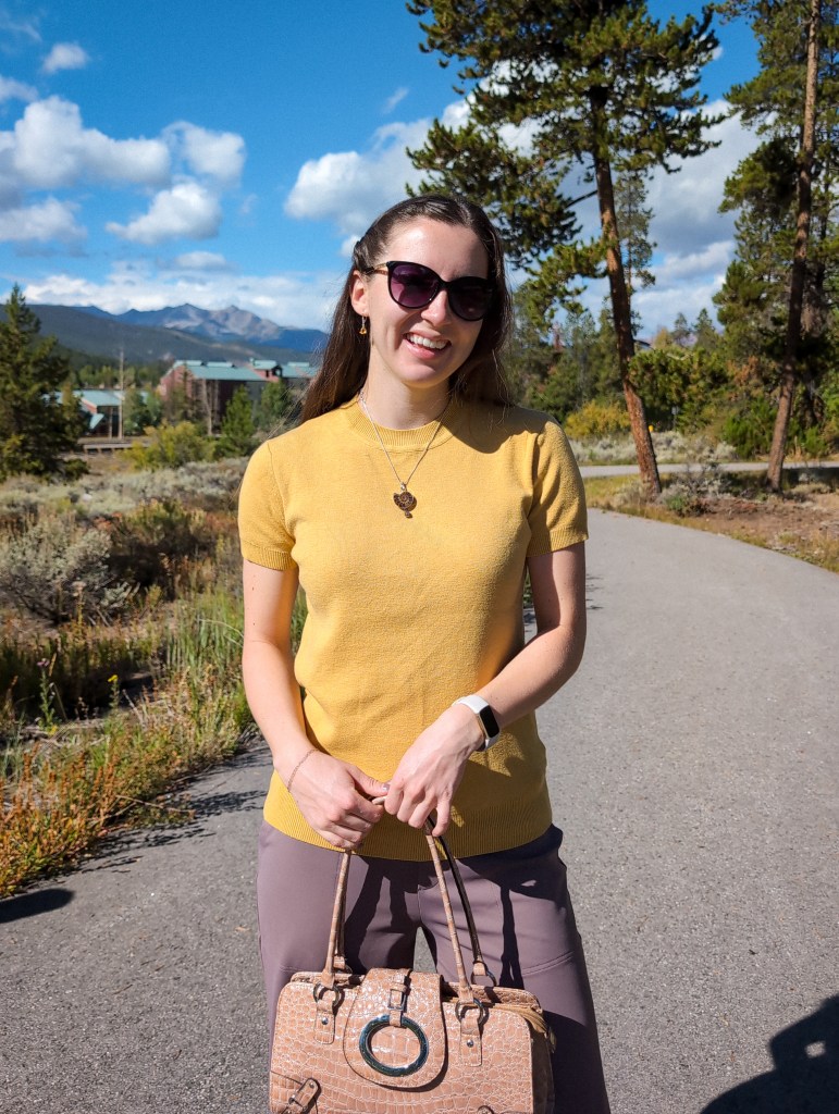 fall fashion conference style yellow sweater mauve pants citrine jewelry