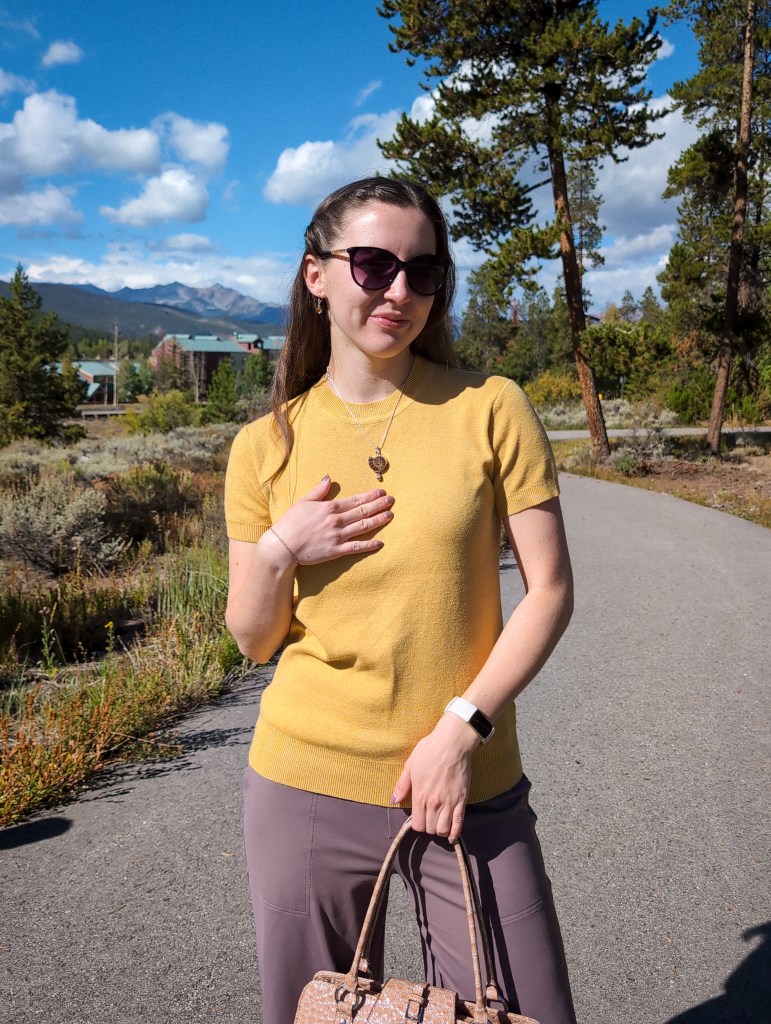 yellow short sleeve sweater shell necklace black sunglasses fall fashion