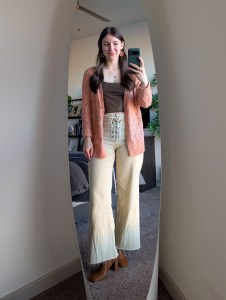 brown pleather top cardigan off white jeans laceup pants middle part