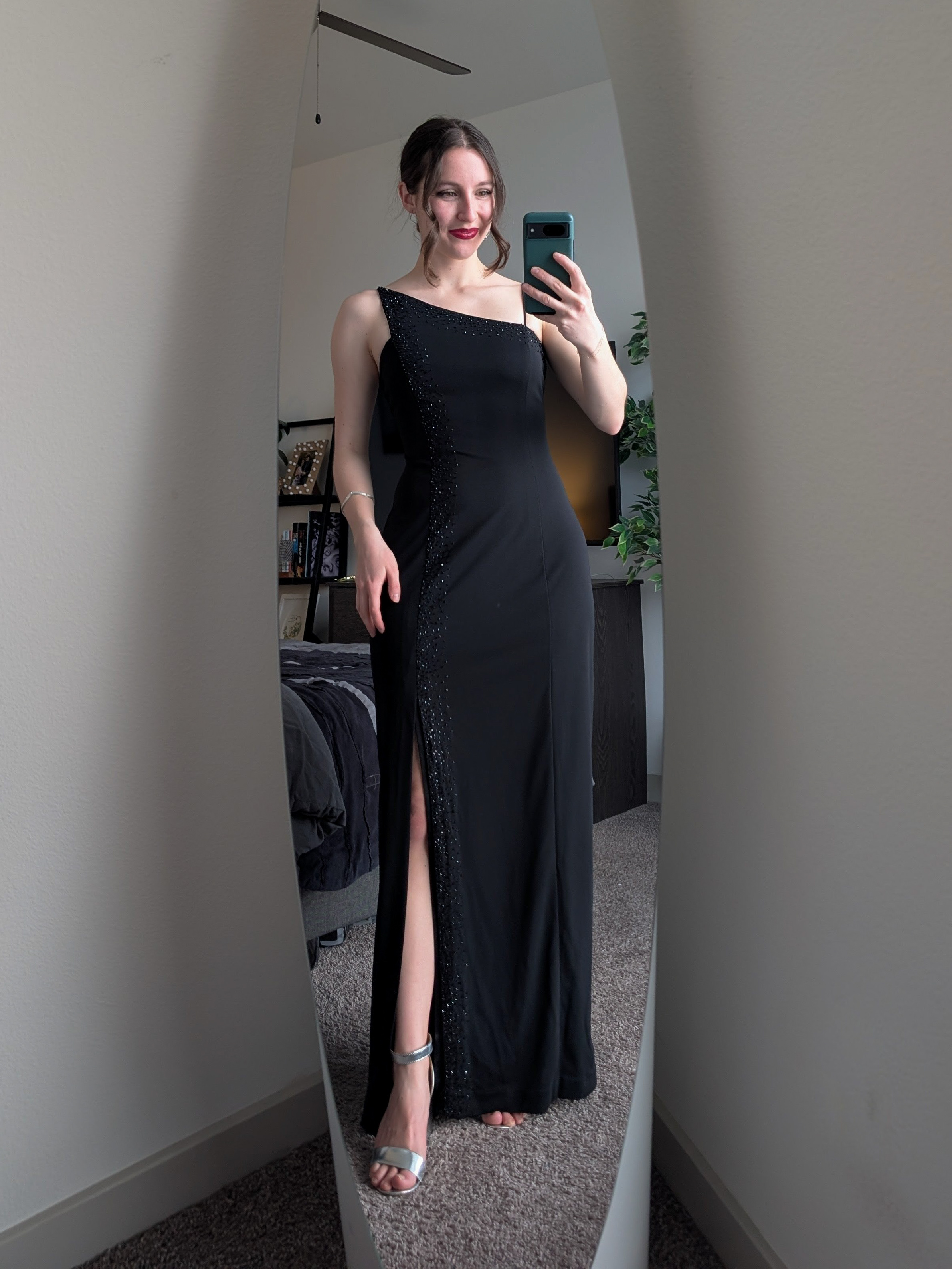 black asymmetric gown oscars watch party hand-me-down prom dress silver heels