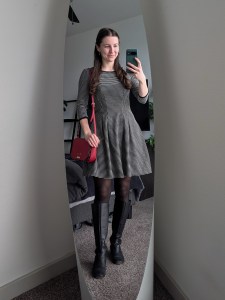 red Kate Spade purse old fashioned dress black knee boots tights