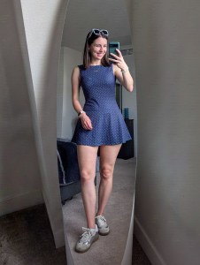 navy polka dot mini dress striped sunglasses silver sneakers